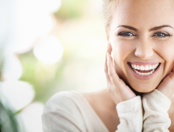 Happy woman with nice skin smiling